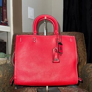 Coach Rogue 31 in Ruby Red pebbled, leather gunmetal hardware